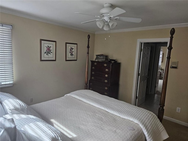 bedroom featuring dark carpet, crown molding, baseboards, and ceiling fan