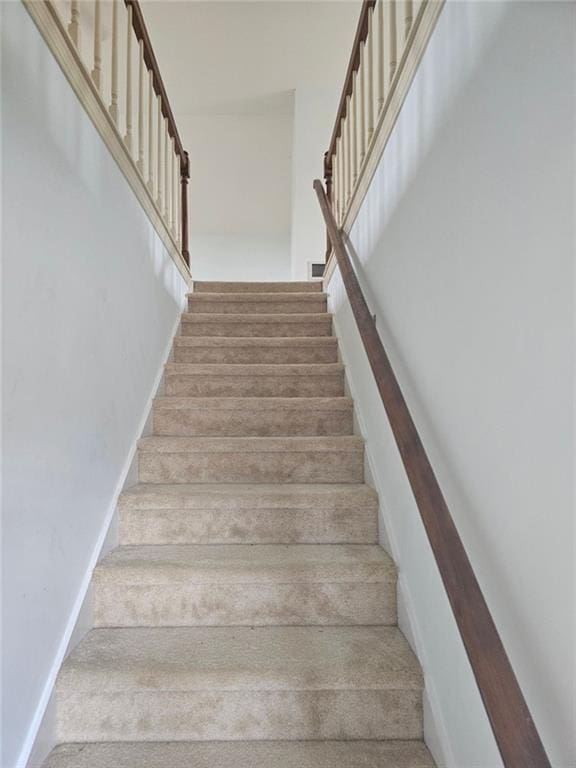 staircase with baseboards