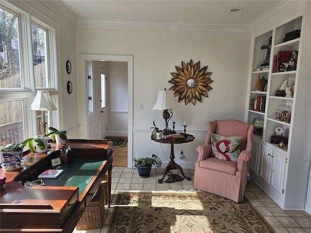 living area with light tile patterned flooring, built in features, and crown molding