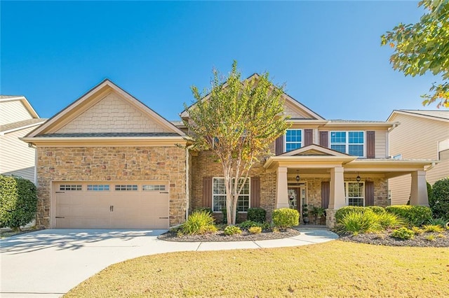 2235 Well Springs Dr, Buford, GA 30519 - craftsman inspired home with stone siding, a front lawn, an attached garage, and driveway