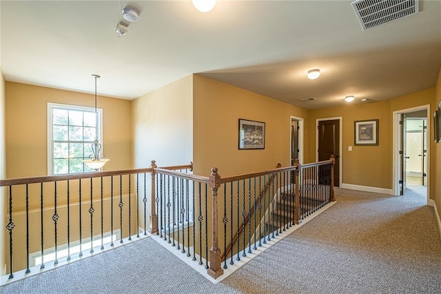2235 Well Springs Dr, Buford, GA 30519 - corridor with an upstairs landing, carpet floors, and baseboards