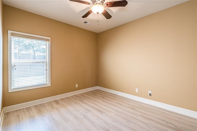 2235 Well Springs Dr, Buford, GA 30519 - unfurnished room with light wood-type flooring, ceiling fan, and baseboards