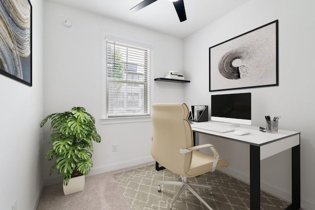 office featuring carpet floors and ceiling fan