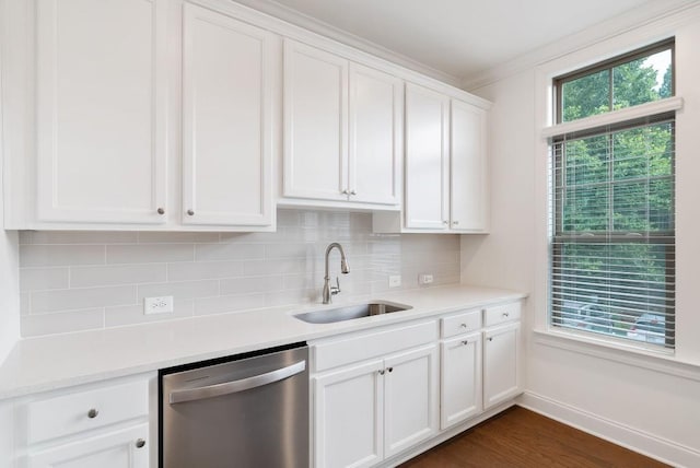 kitchen featuring sink, dark wood-type flooring, dishwasher, white cabinetry, and tasteful backsplash