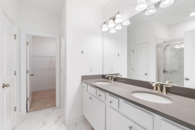 bathroom with an enclosed shower and vanity