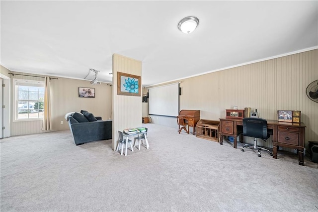 carpeted office space with ornamental molding