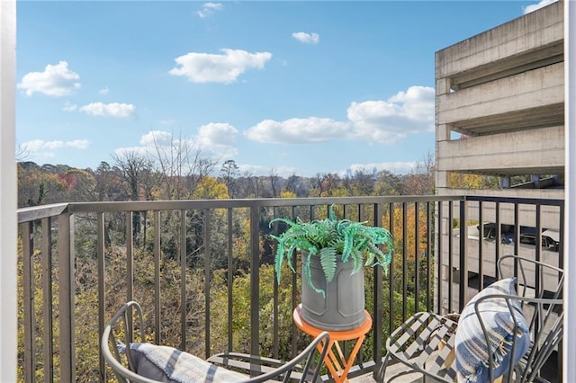 balcony with a forest view