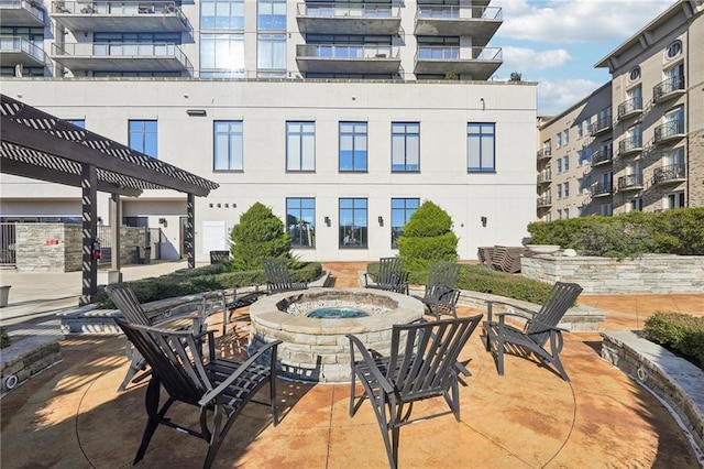 view of patio / terrace featuring a fire pit