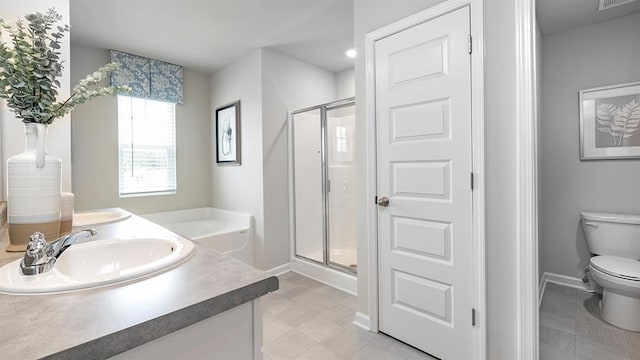 full bath with double vanity, a stall shower, visible vents, toilet, and a sink