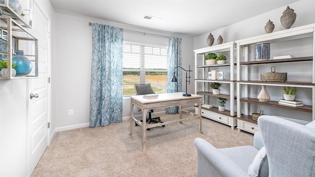 home office with carpet flooring, visible vents, and baseboards