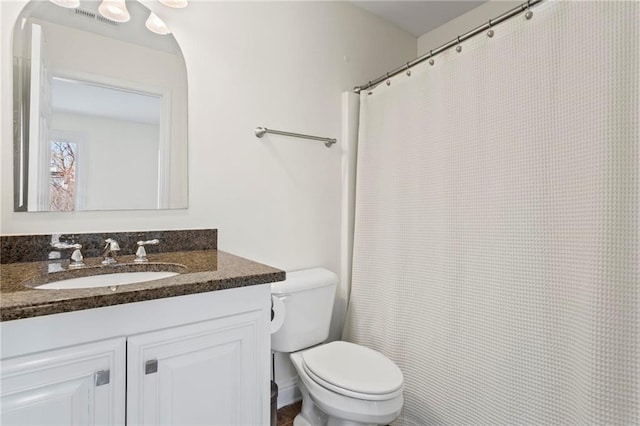 7105 Haw Crk, Gainesville, GA 30506 - bathroom with visible vents, toilet, and vanity