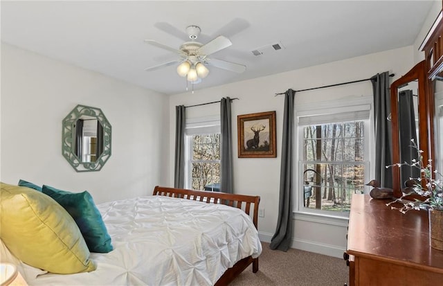 7105 Haw Crk, Gainesville, GA 30506 - carpeted bedroom featuring visible vents, a ceiling fan, and baseboards