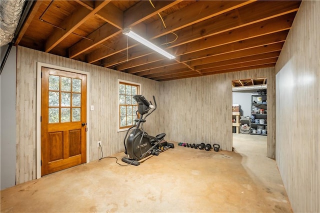 workout room featuring concrete floors