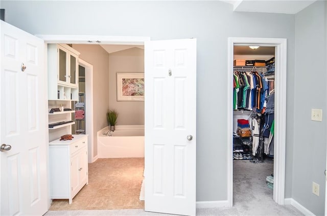 interior space featuring light colored carpet