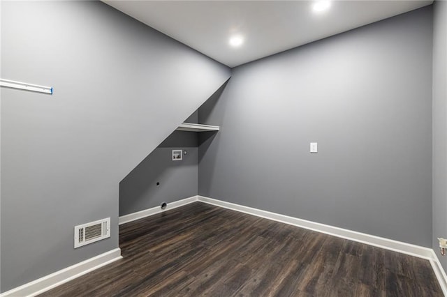 3845 Glen Ian Dr, Loganville, GA 30052 - laundry area with baseboards, dark wood-style floors, and recessed lighting