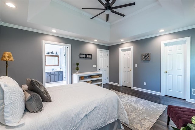 3845 Glen Ian Dr, Loganville, GA 30052 - bedroom featuring a raised ceiling, baseboards, ornamental molding, recessed lighting, and dark wood-style floors