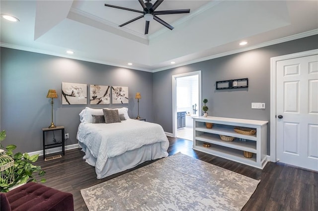 3845 Glen Ian Dr, Loganville, GA 30052 - bedroom featuring a raised ceiling, crown molding, wood finished floors, baseboards, and recessed lighting