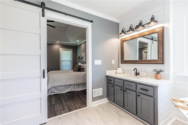 3845 Glen Ian Dr, Loganville, GA 30052 - ensuite bathroom featuring crown molding, marble finish floors, vanity, and baseboards