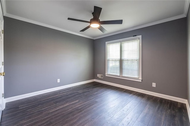 3845 Glen Ian Dr, Loganville, GA 30052 - empty room featuring baseboards, dark wood-type flooring, a ceiling fan, and ornamental molding