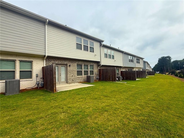 2059 Lanier Harbor Pt, Buford, GA 30518 - back of property with a patio and brick siding