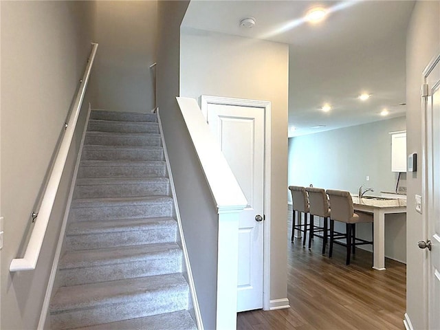 2059 Lanier Harbor Pt, Buford, GA 30518 - stairs featuring wood finished floors and recessed lighting