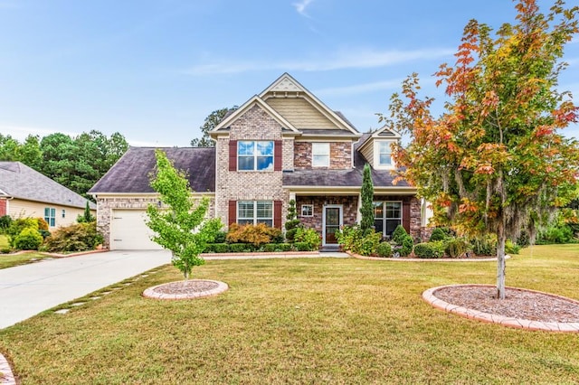 craftsman house featuring a front lawn and a garage