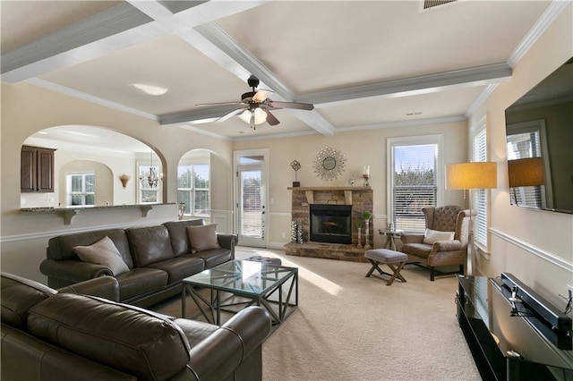 1307 Clarecastle Ln, Buford, GA 30519 - carpeted living room featuring crown molding, ceiling fan, coffered ceiling, beamed ceiling, and a fireplace