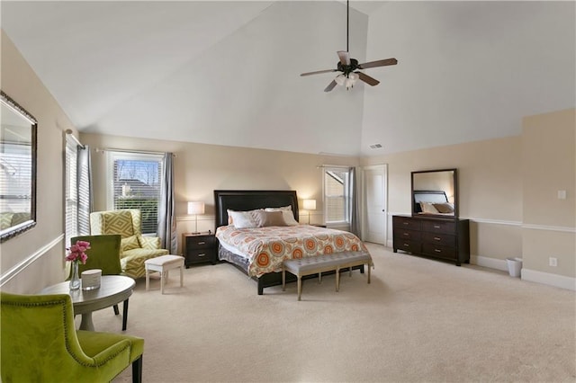 1307 Clarecastle Ln, Buford, GA 30519 - bedroom featuring light colored carpet, ceiling fan, high vaulted ceiling, and baseboards