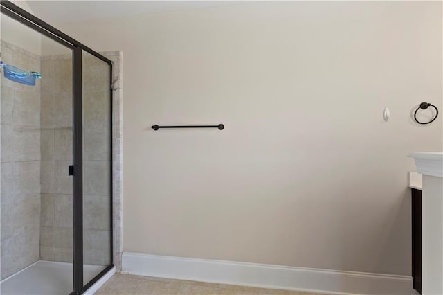 1307 Clarecastle Ln, Buford, GA 30519 - full bathroom with a stall shower, baseboards, and vanity