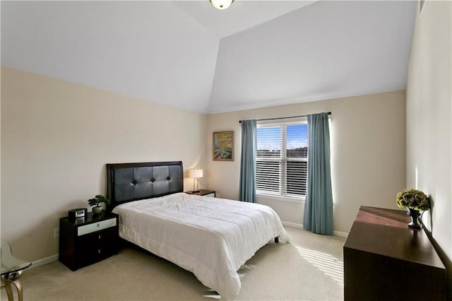 1307 Clarecastle Ln, Buford, GA 30519 - bedroom featuring light colored carpet, vaulted ceiling, and baseboards
