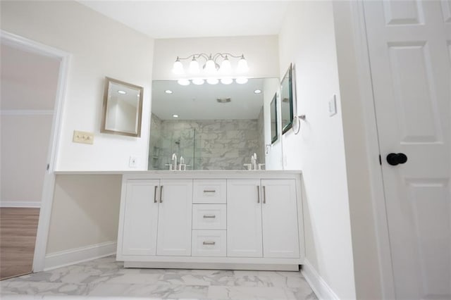 bathroom featuring vanity and walk in shower