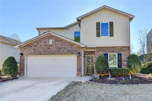 traditional-style home with brick siding, driveway, and an attached garage