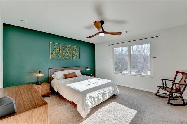 bedroom featuring carpet flooring, ceiling fan, and baseboards