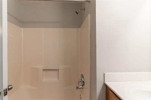 full bath featuring shower / washtub combination and vanity