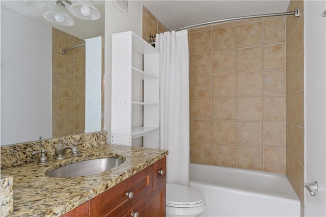 full bath featuring a textured ceiling, visible vents, shower / bath combo, vanity, and toilet