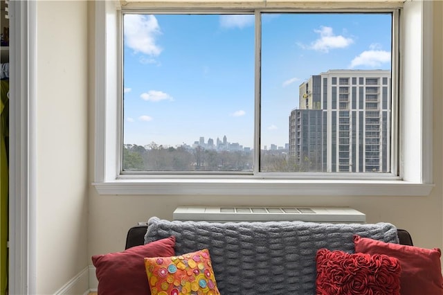 bedroom featuring a view of city