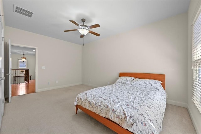 4782 Lakeway, Alpharetta, GA 30005 - bedroom featuring light colored carpet, visible vents, a ceiling fan, and baseboards