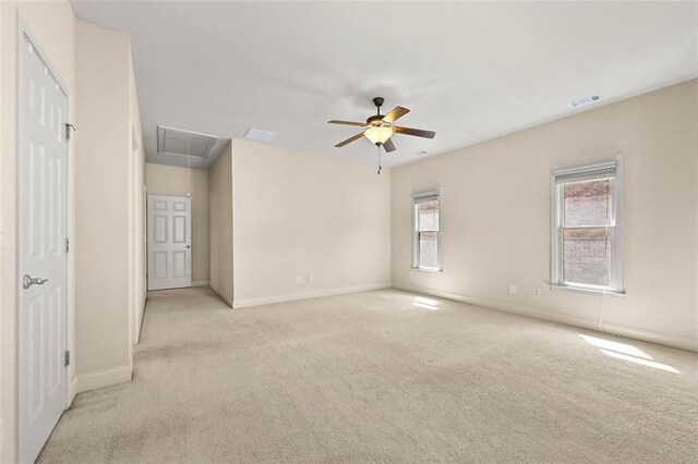 4782 Lakeway, Alpharetta, GA 30005 - empty room with visible vents, baseboards, attic access, light carpet, and a ceiling fan