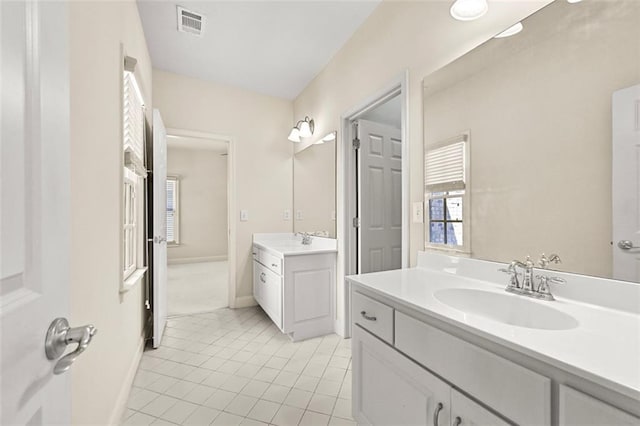 4782 Lakeway, Alpharetta, GA 30005 - bathroom with visible vents, a wealth of natural light, and a sink