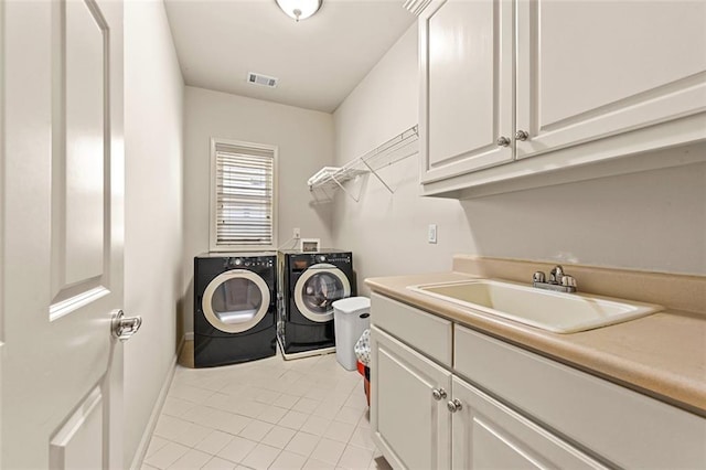 4782 Lakeway, Alpharetta, GA 30005 - laundry room featuring a sink, cabinet space, light tile patterned floors, separate washer and dryer, and visible vents