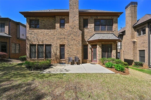 4782 Lakeway, Alpharetta, GA 30005 - rear view of property with a patio, a yard, brick siding, and a chimney