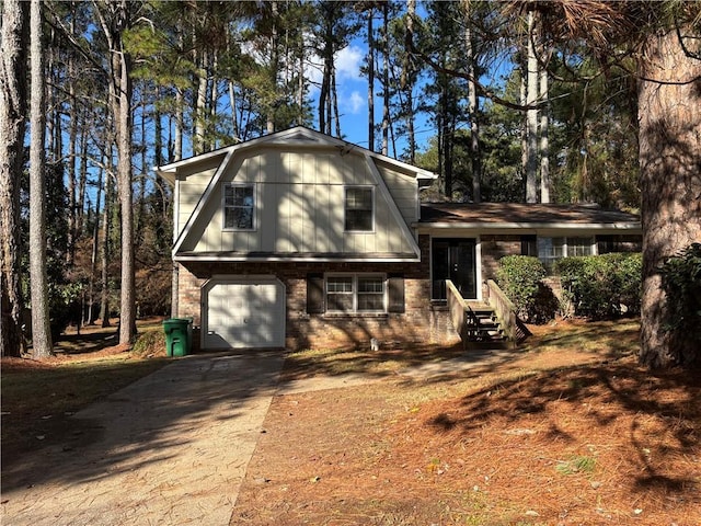 split level home with a garage