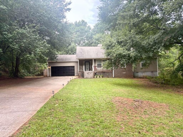single story home with concrete driveway, crawl space, an attached garage, a front yard, and a porch