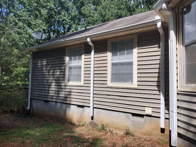 view of property exterior featuring crawl space