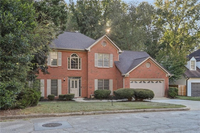 colonial home featuring a garage