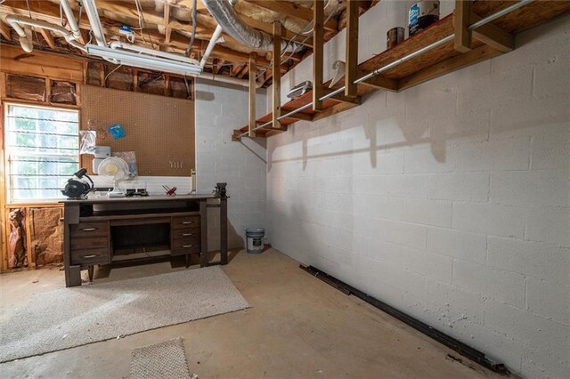 basement with a workshop area