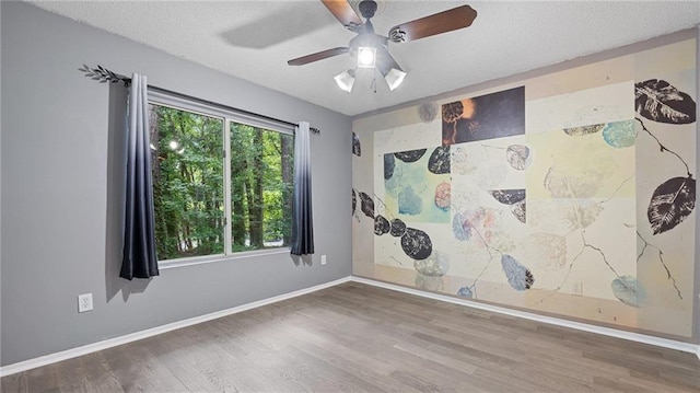 47 Arbor End, Smyrna, GA 30080 - empty room featuring wood finished floors, a textured ceiling, and ceiling fan