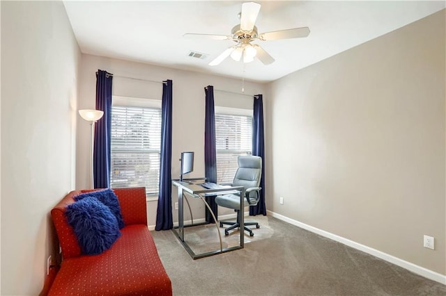 office featuring carpet and ceiling fan