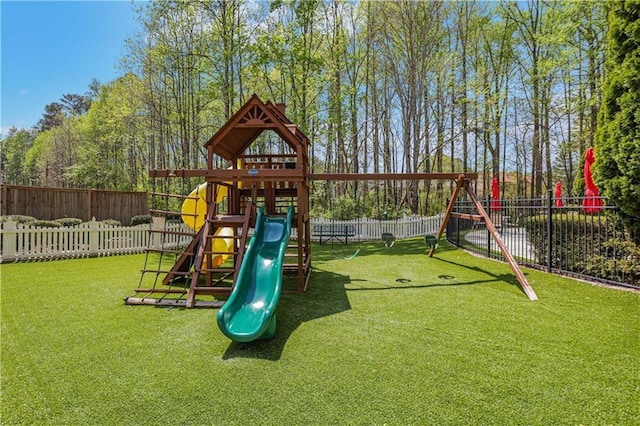 view of jungle gym featuring a yard