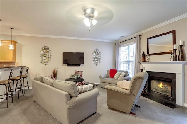 living room with light colored carpet, ceiling fan, and ornamental molding